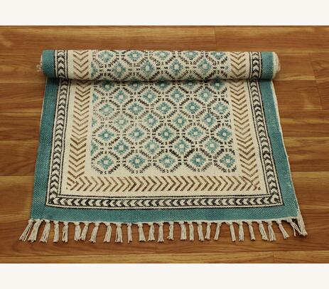 Block printed organic cotton motifs teal tasseled rug