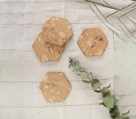 Hand cut hexagonal cork coasters