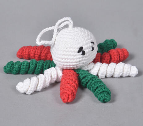 Hand crochet octopus soft toy