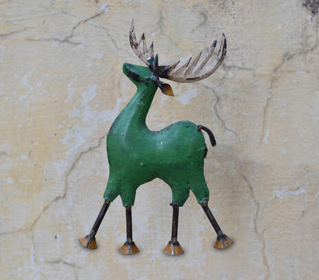 Hand beaten galvanized and recycle iron reindeer wall mount