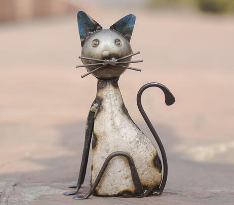 Hand beaten recycled iron standing cat