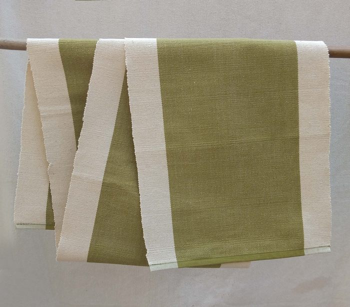 Solid handwoven cotton table runner with plain border