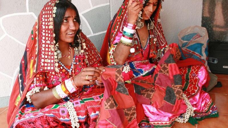 Women artisans working on Sandur Lambani embroidery