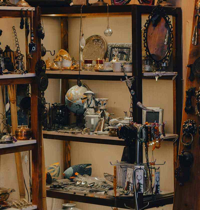 Second hand products displayed on a shop shelf